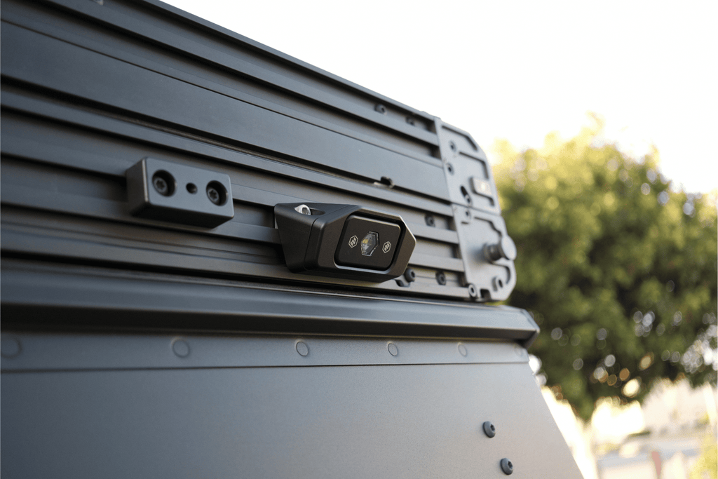 Roof rack system on a vehicle with a blurred natural background