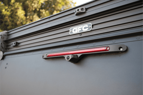 Close-up of a vehicle roof rack system with GFC branding.
